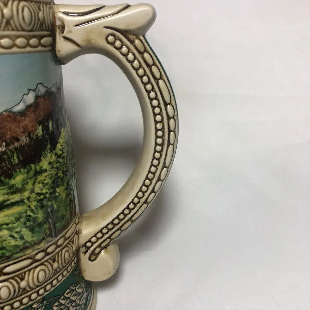 1990 Edition Coors Beer Vintage Stein showing bottles near a waterfall